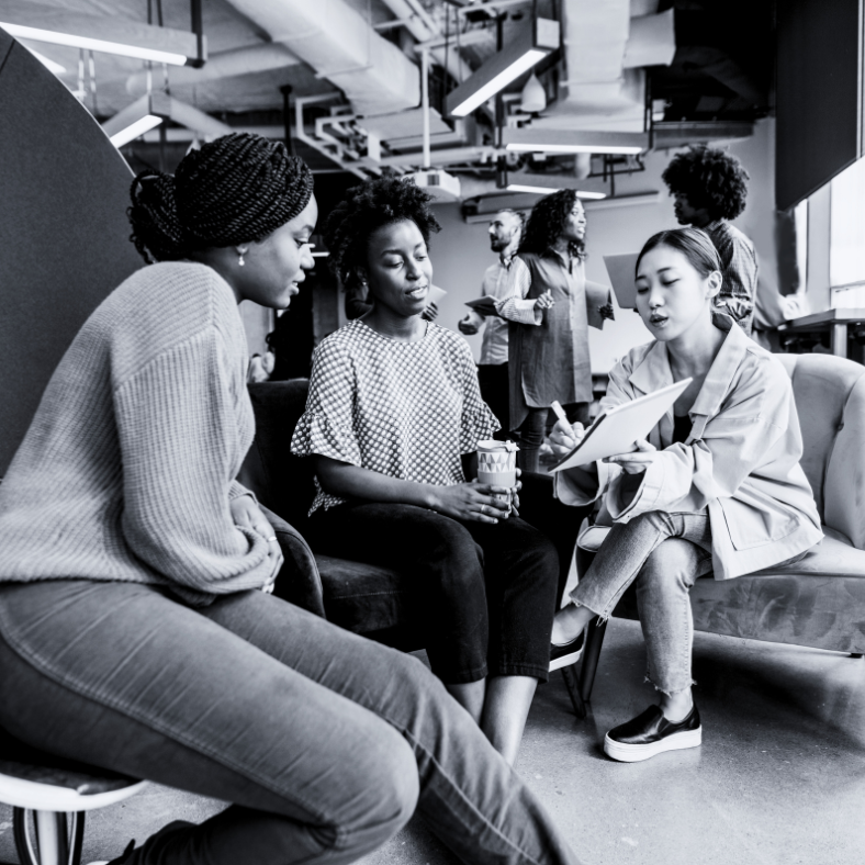 Group sitting and conversing.