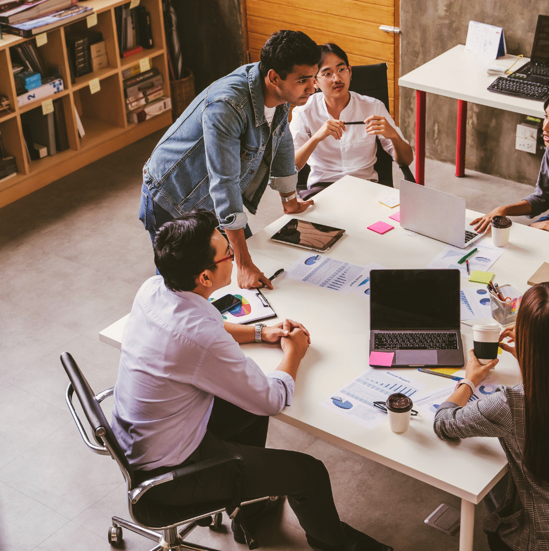 Team working at an office table.